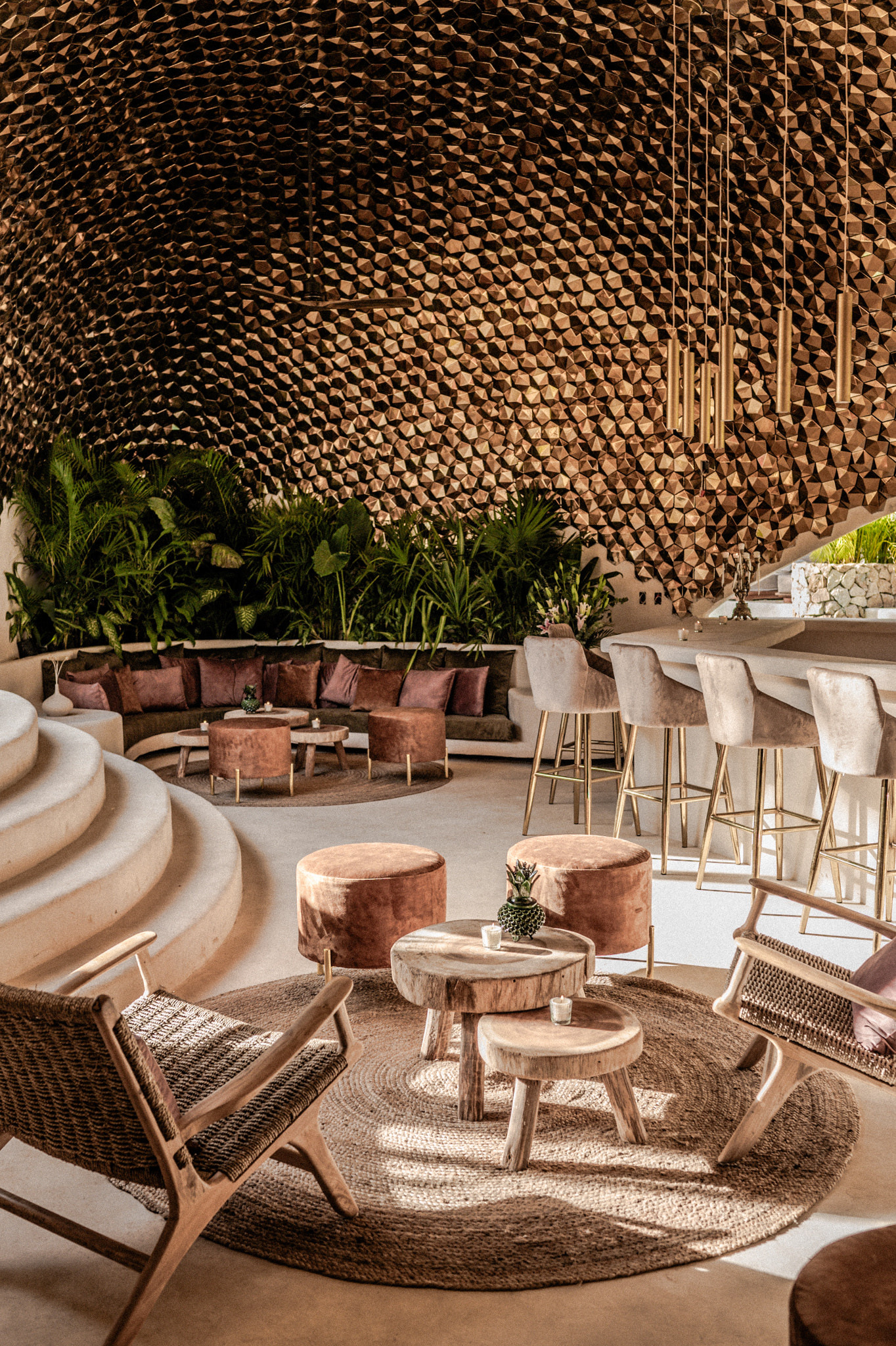 The MILAM Tulum bar with a round golden structure
